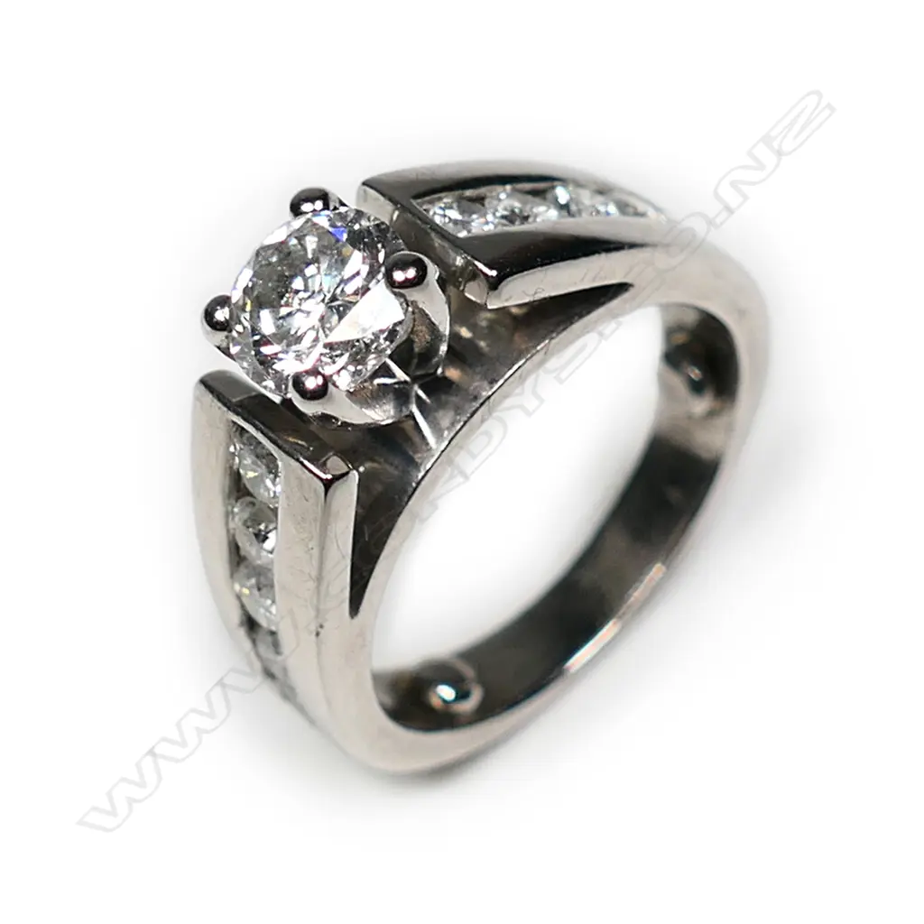A 14ct white gold diamond solitaire ring Image 1++