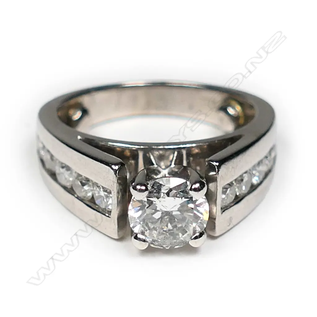 A 14ct white gold diamond solitaire ring Image 1++