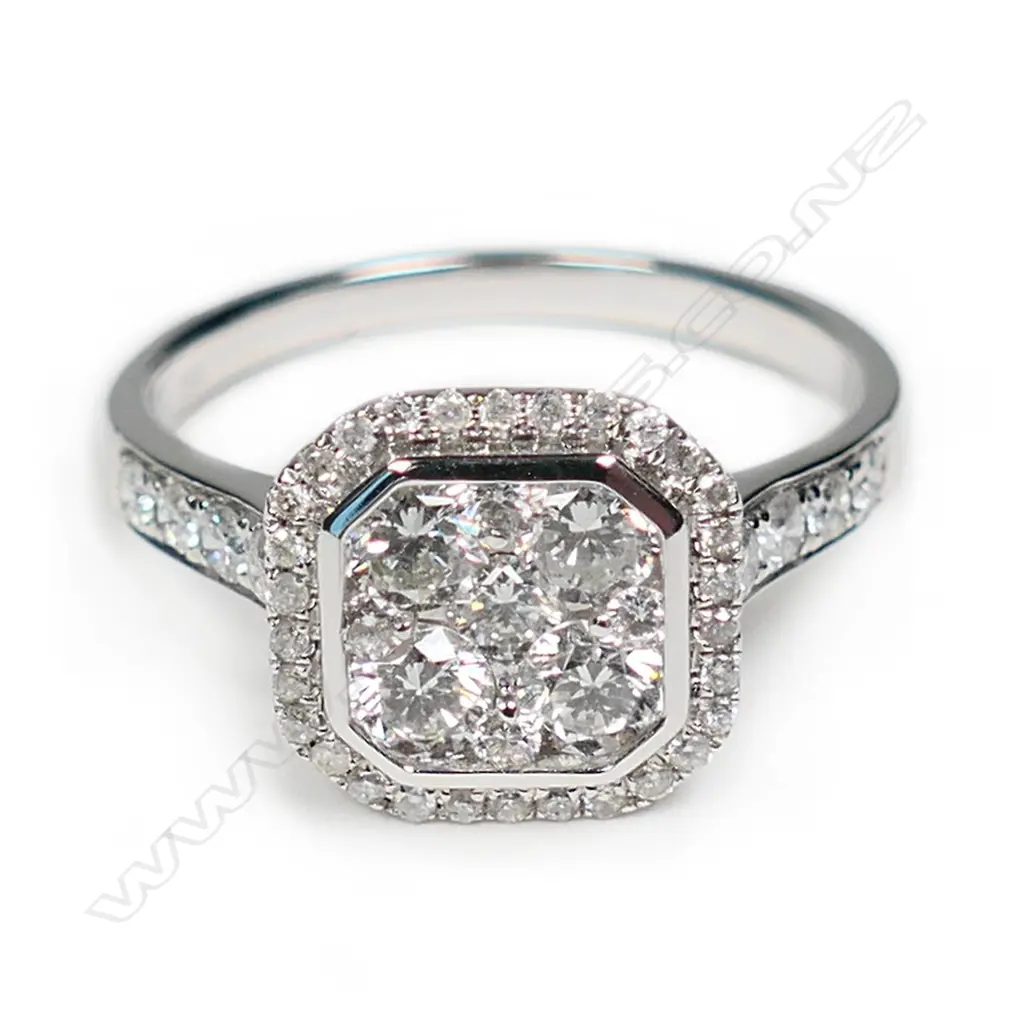 A modern 18ct white gold and diamond cluster ring Image 1++