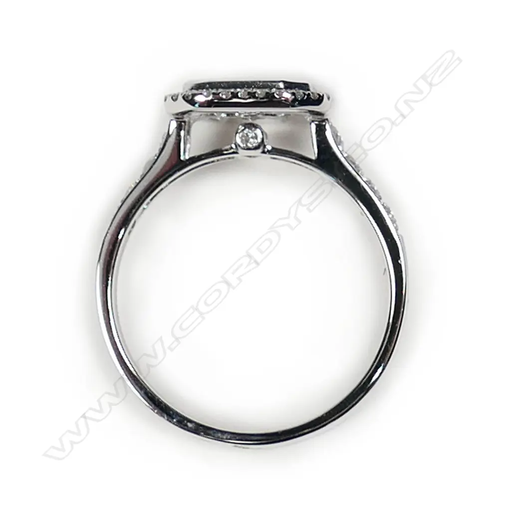 A modern 18ct white gold and diamond cluster ring Image 1++