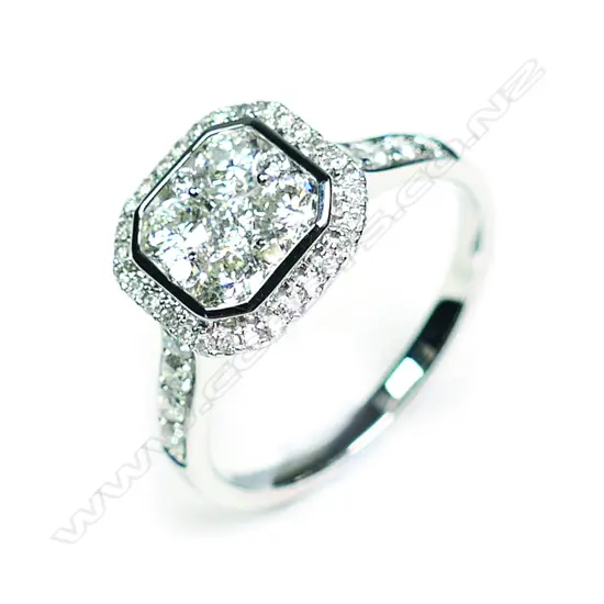 A modern 18ct white gold and diamond cluster ring