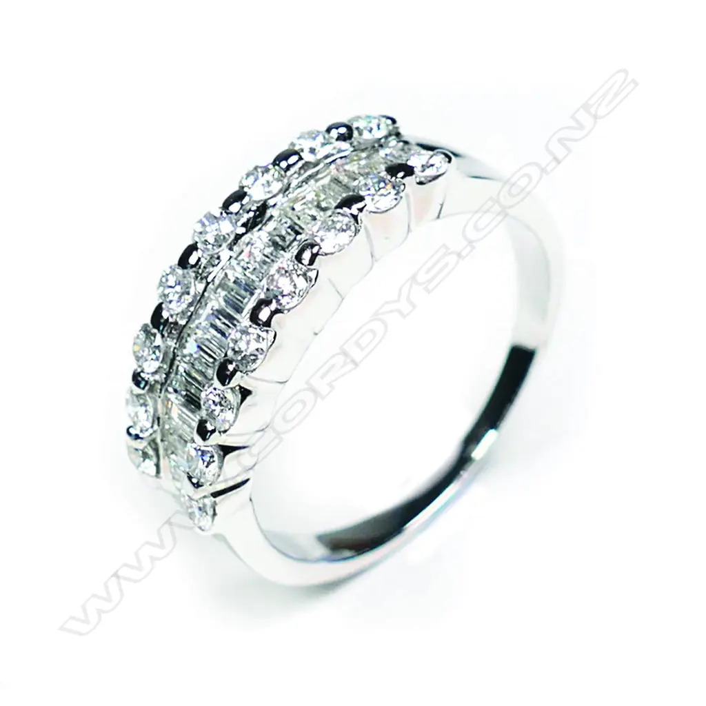 An 18ct white gold and multi diamond ring Image 1++