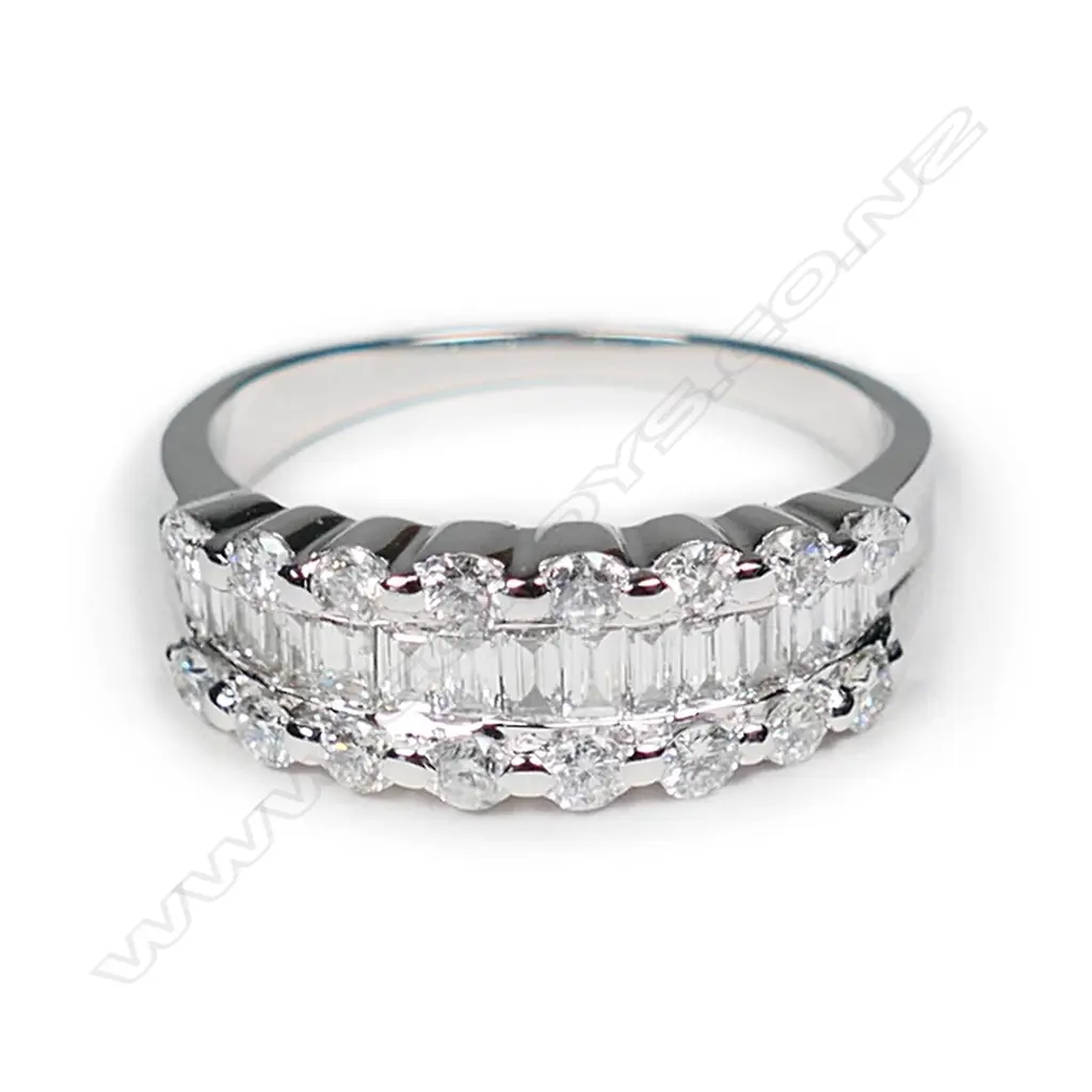 An 18ct white gold and multi diamond ring Image 1++