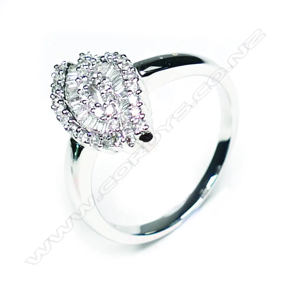 An 18ct white gold and multi diamond set designer ring Image 1++