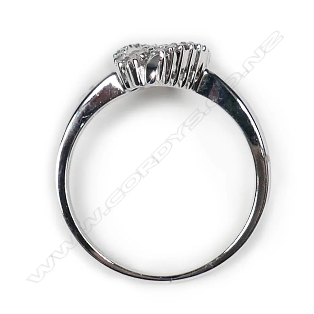 An 18ct white gold and multi diamond set designer ring Image 1++
