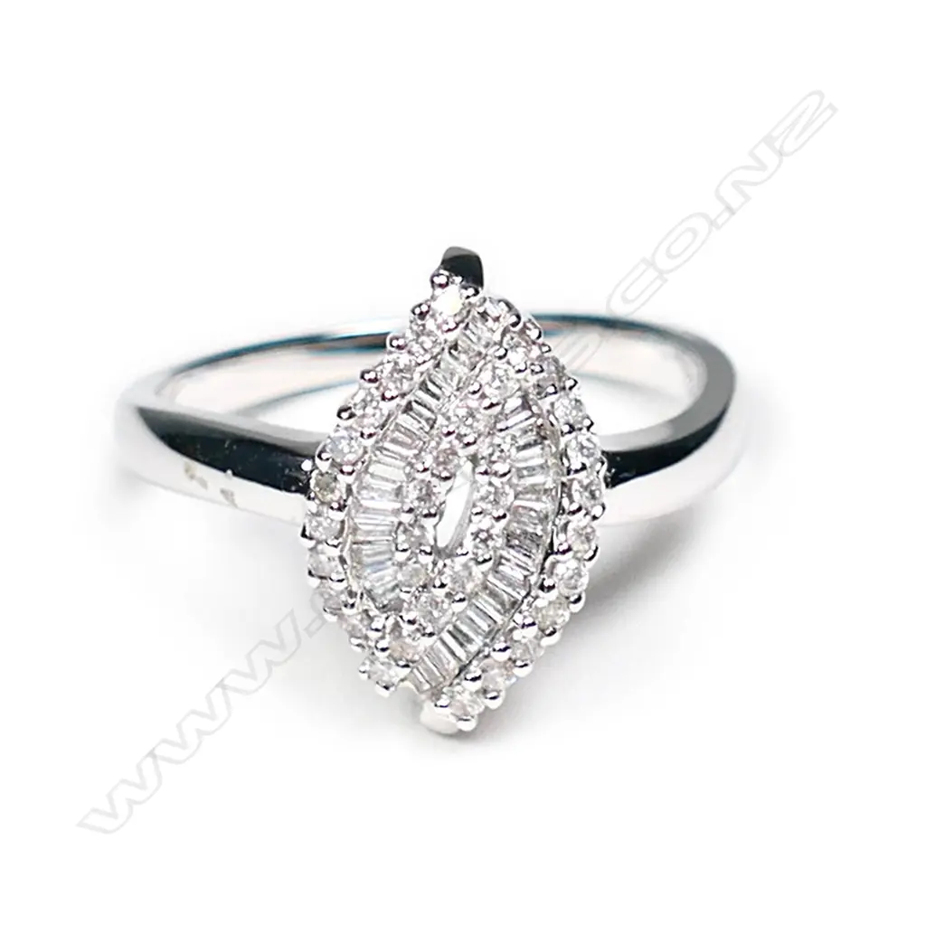 An 18ct white gold and multi diamond set designer ring Image 1++