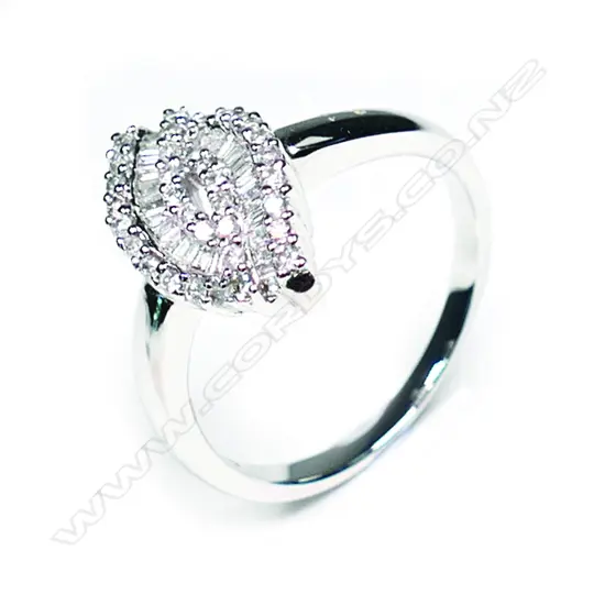 An 18ct white gold and multi diamond set designer ring