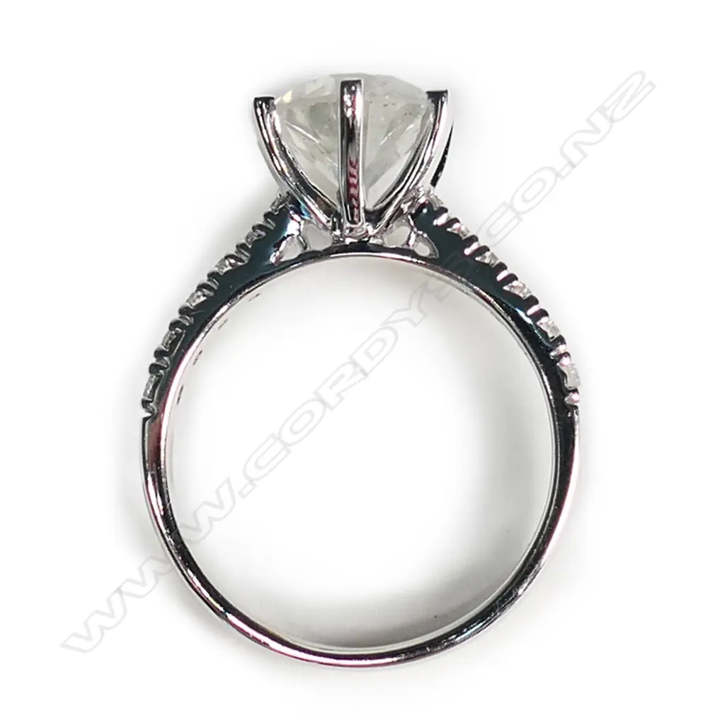 A 14ct white gold and diamond solitaire ring Image 1++