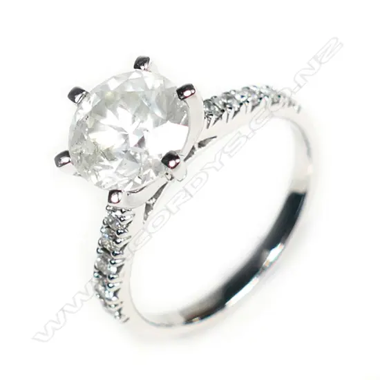 A 14ct white gold and diamond solitaire ring