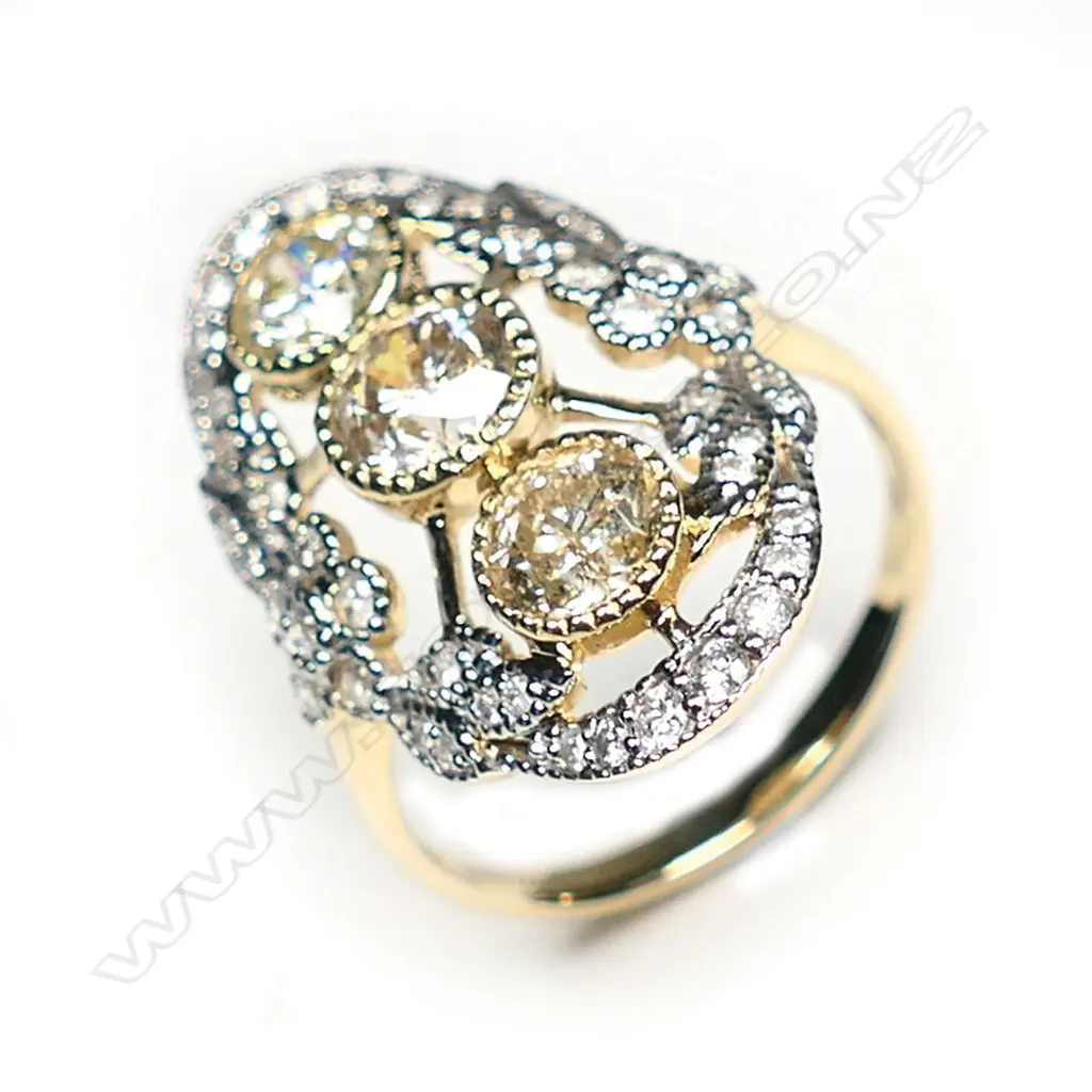A 14ct gold and diamond Art Deco style ring Image 1++