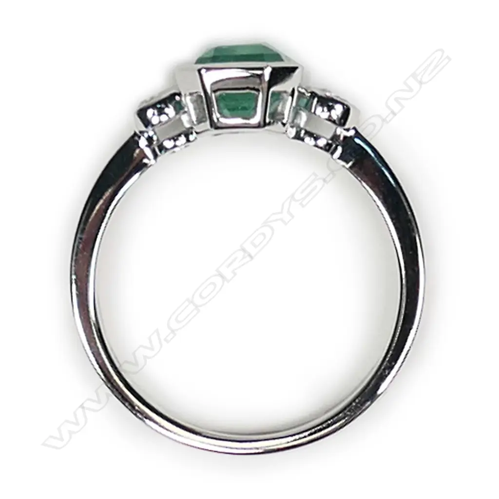 A 14ct white gold Colombian emerald and diamond ring Image 1++
