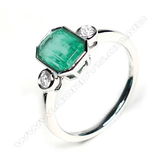 A 14ct white gold Colombian emerald and diamond ring