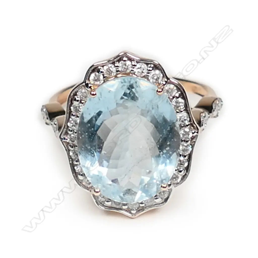 A 14ct rose gold aquamarine and diamond vintage style ring Image 1++