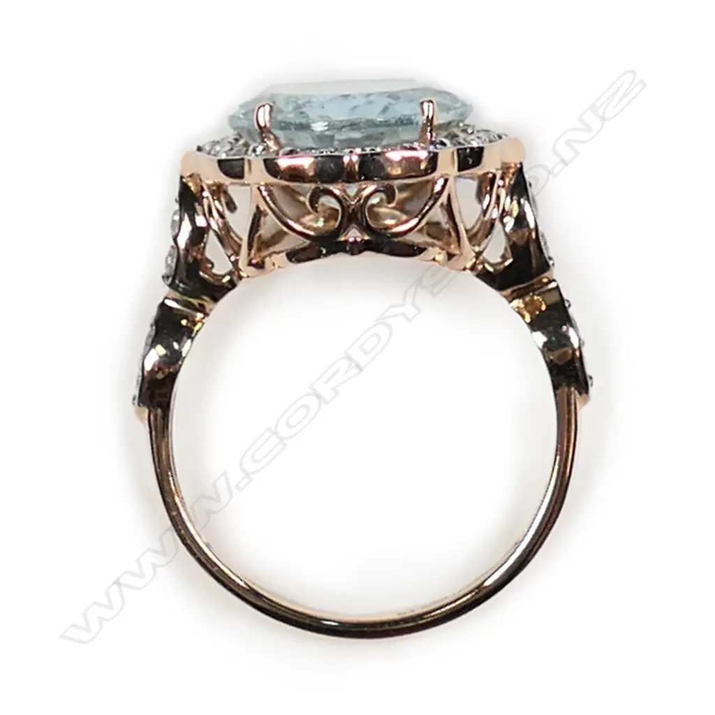 A 14ct rose gold aquamarine and diamond vintage style ring Image 1++
