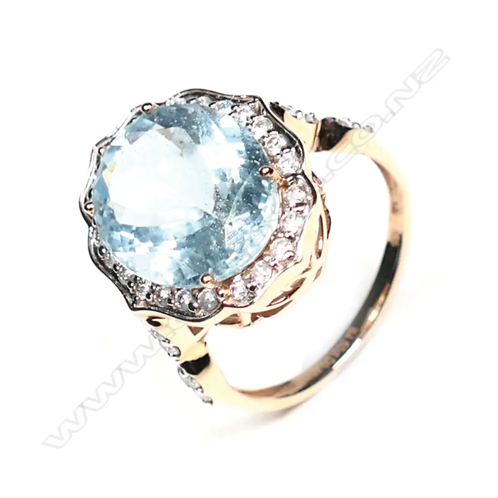 A 14ct rose gold aquamarine and diamond vintage style ring Image 1++