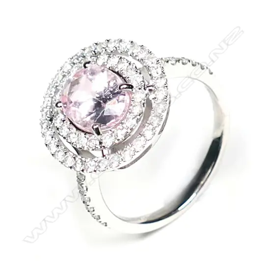 A 14ct white gold morganite and diamond double halo ring