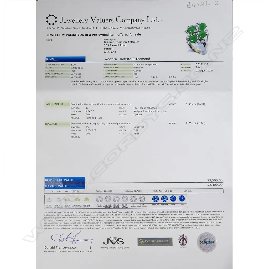 An 18ct white gold jadeite and diamond ring Image 1++