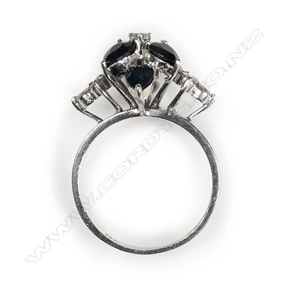 A 14ct white gold sapphire and diamond ring Image 1++