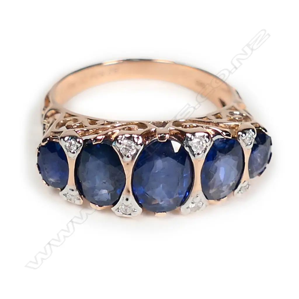 A 14ct rose gold sapphire and diamond London Bridge style ring Image 1++