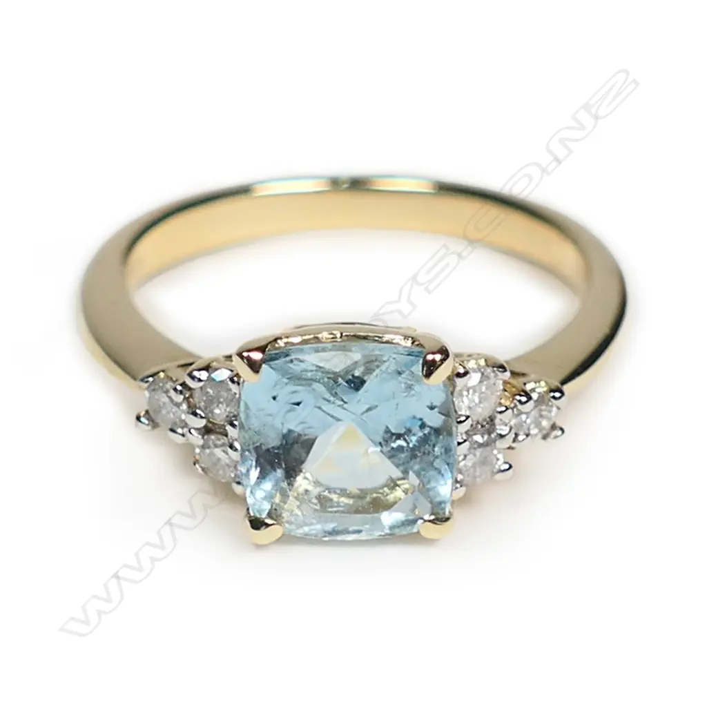 A 14ct yellow gold aquamarine and diamond ring Image 1++