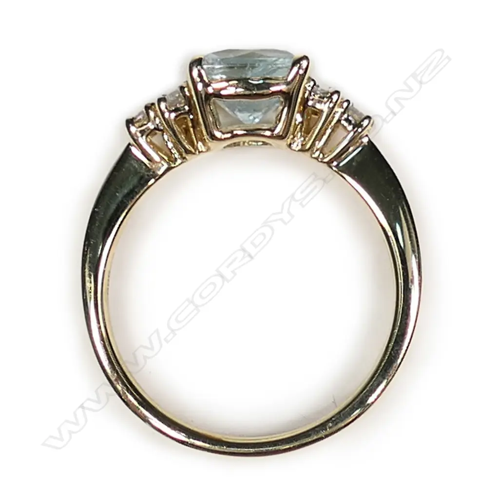 A 14ct yellow gold aquamarine and diamond ring Image 1++