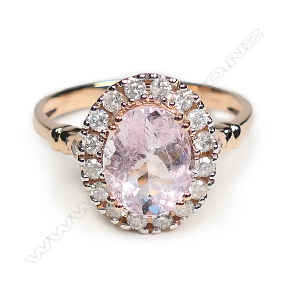 A 14ct rose gold morganite and diamond halo ring Image 1++