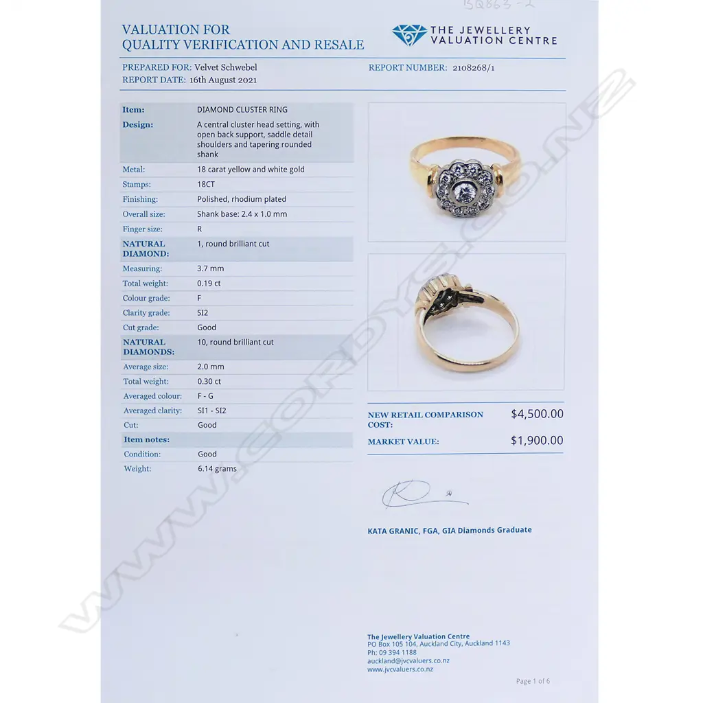 An 18ct gold and diamond cluster ring Image 1++