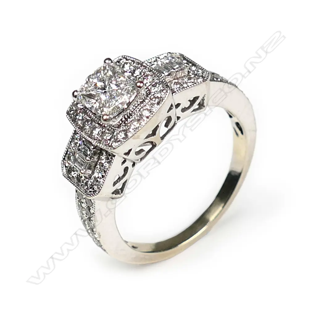 A 14ct white gold and diamond dress ring Image 1++