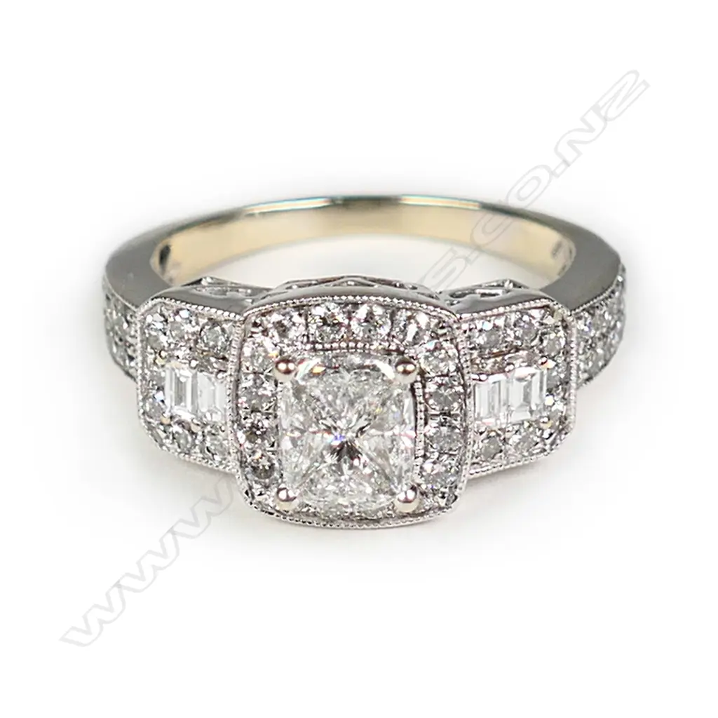 A 14ct white gold and diamond dress ring Image 1++