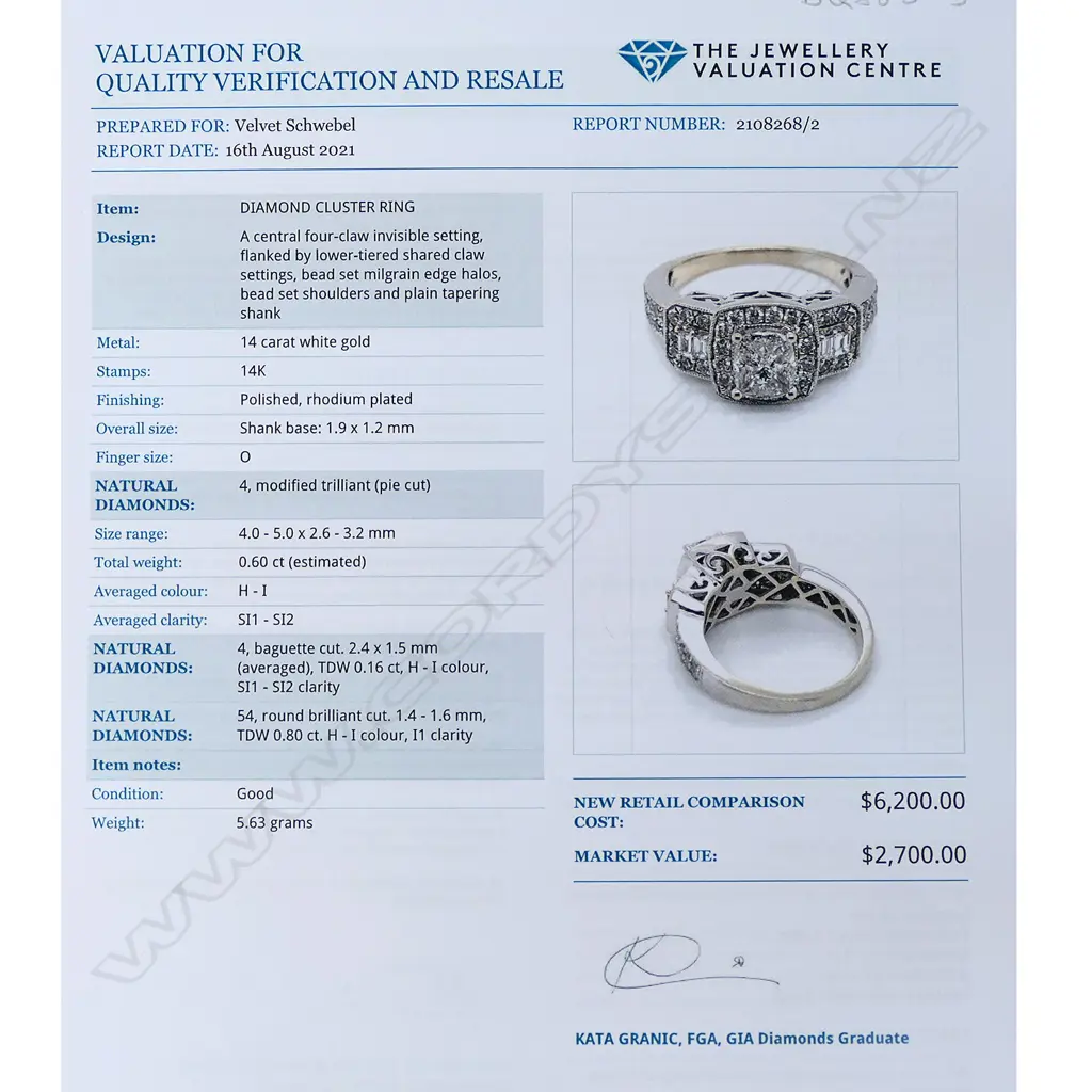 A 14ct white gold and diamond dress ring Image 1++