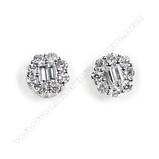 A pair of 18ct white gold and diamond cluster earrings