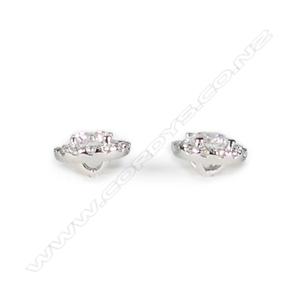A pair of 18ct white gold and diamond cluster earrings Image 1++