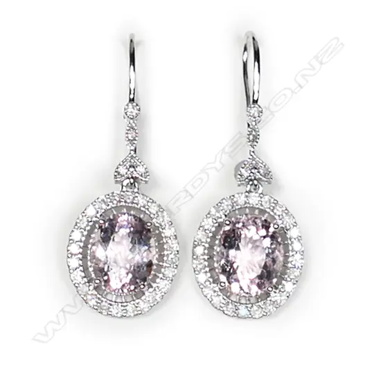 A pair of 14ct white gold morganite and diamond antique style halo drop earrings