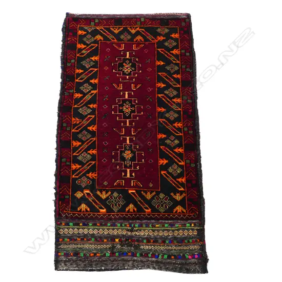 An Afghan bedding bag