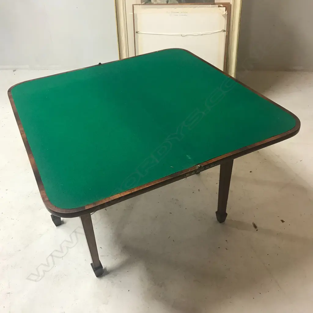 A George III mahogany fold-over top card table Image 1++