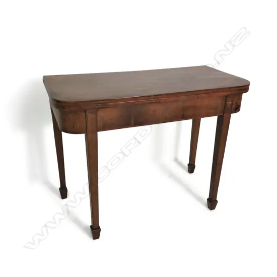 A George III mahogany fold-over top card table