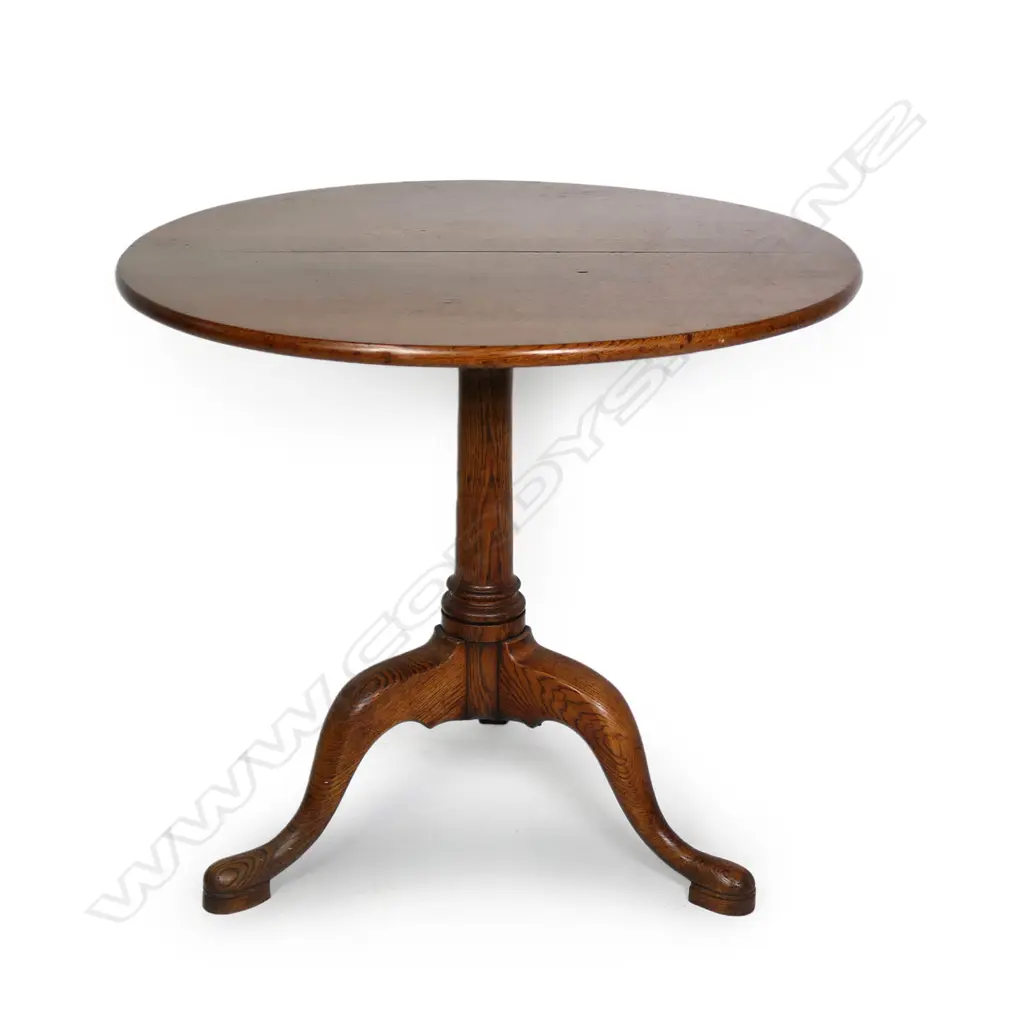 A Georgian oak tilt-top wine table Image 1++