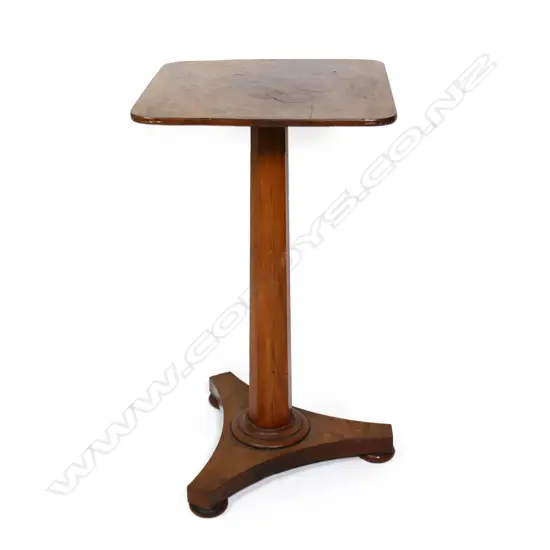 A Regency flame mahogany wine table