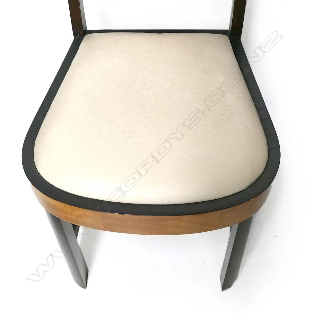 An Art Deco walnut and maple dining suite with six chairs Image 1++