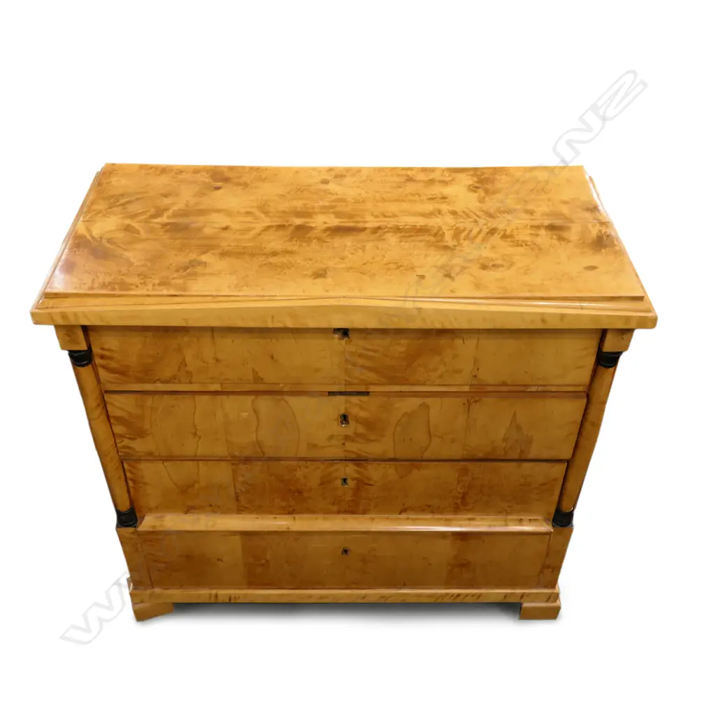 A Biedermeier birch veneer chest of drawers Image 1++