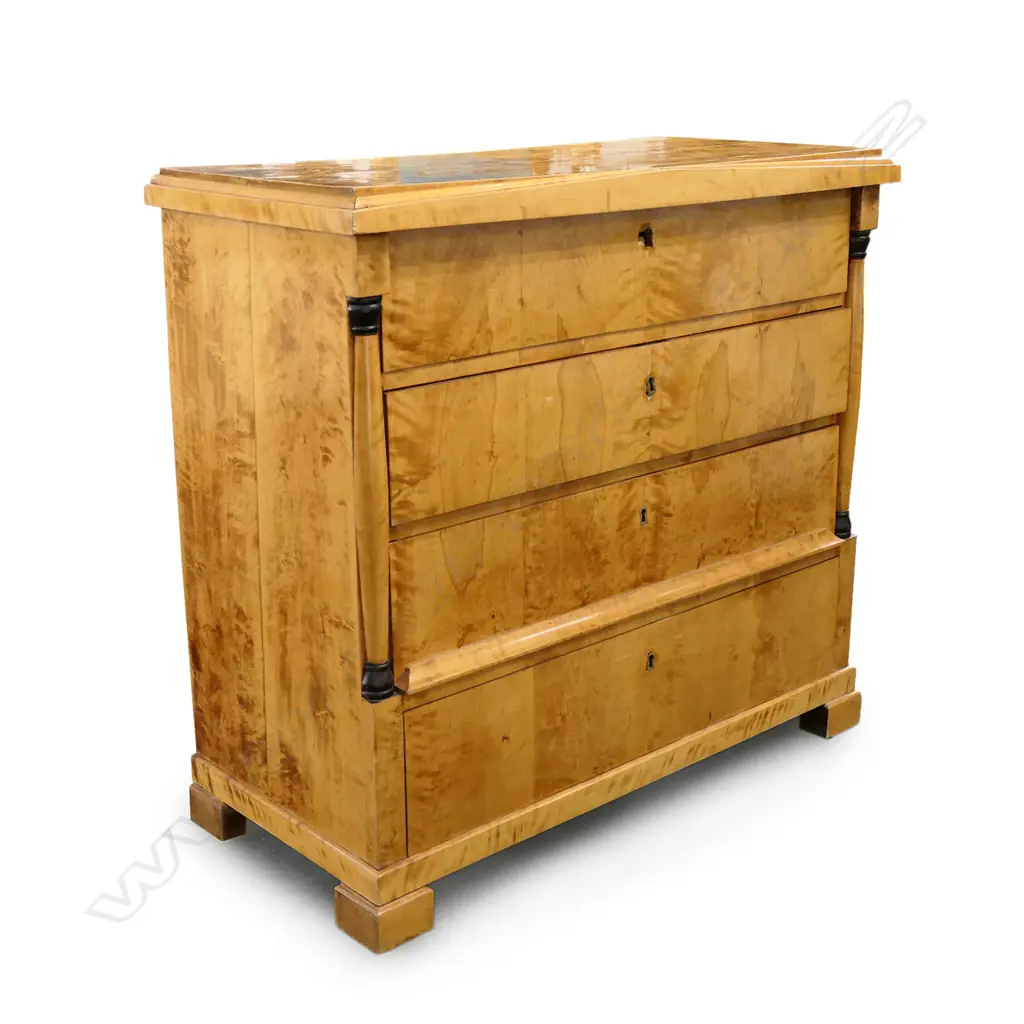 A Biedermeier birch veneer chest of drawers Image 1++