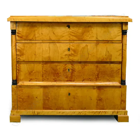 A Biedermeier birch veneer chest of drawers