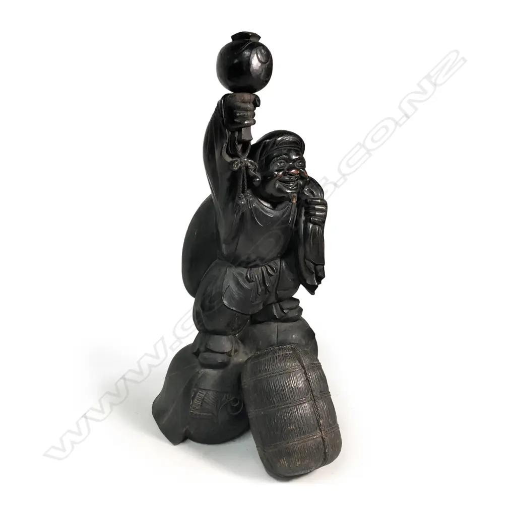 A large and impressive Japanese Edo period carved wood sculpture of Daikoku Image 1++