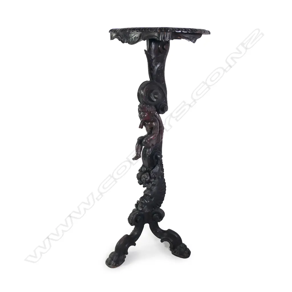 A 19thC highly decorative carved wood torchere Image 1++