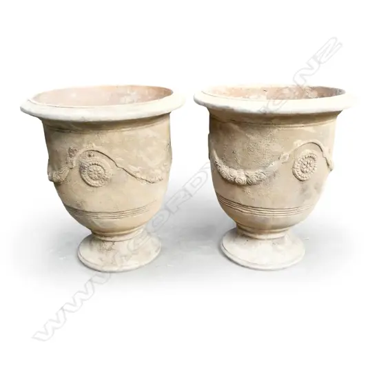 A pair of large classical terracotta garden urns