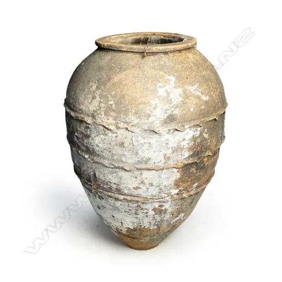 An old European terracotta tall olive oil storage jar