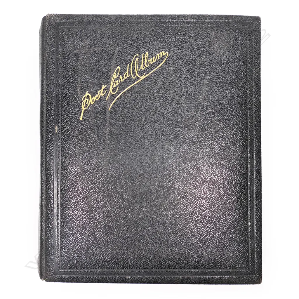 An Edwardian postcard album, containing two hundred and sixty-five postcards, including forty-one Bruce Bairnsfather 'Fragments from France' cards plus other WWI cards, vintage souvenir, travel, humorous, greetings and Japanese cards. Image 1++