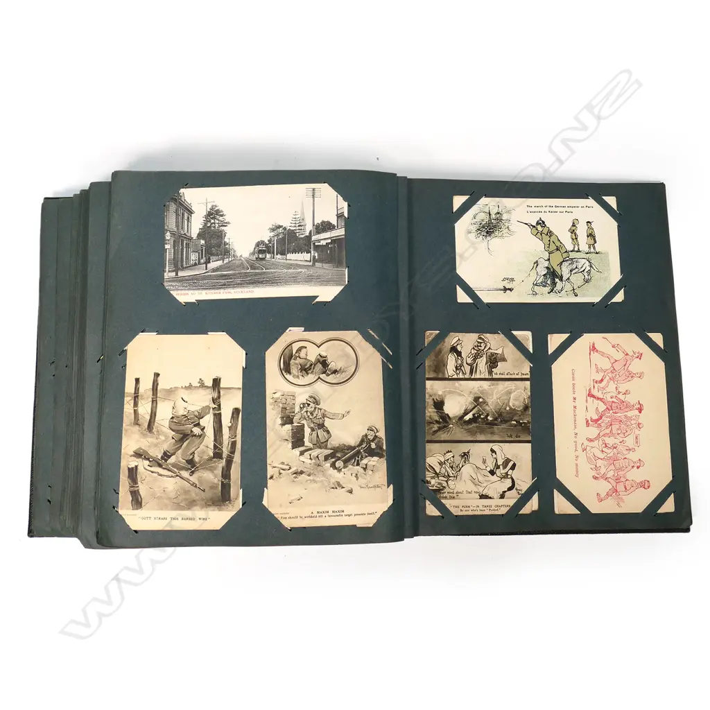An Edwardian postcard album, containing two hundred and sixty-five postcards, including forty-one Bruce Bairnsfather 'Fragments from France' cards plus other WWI cards, vintage souvenir, travel, humorous, greetings and Japanese cards. Image 1++