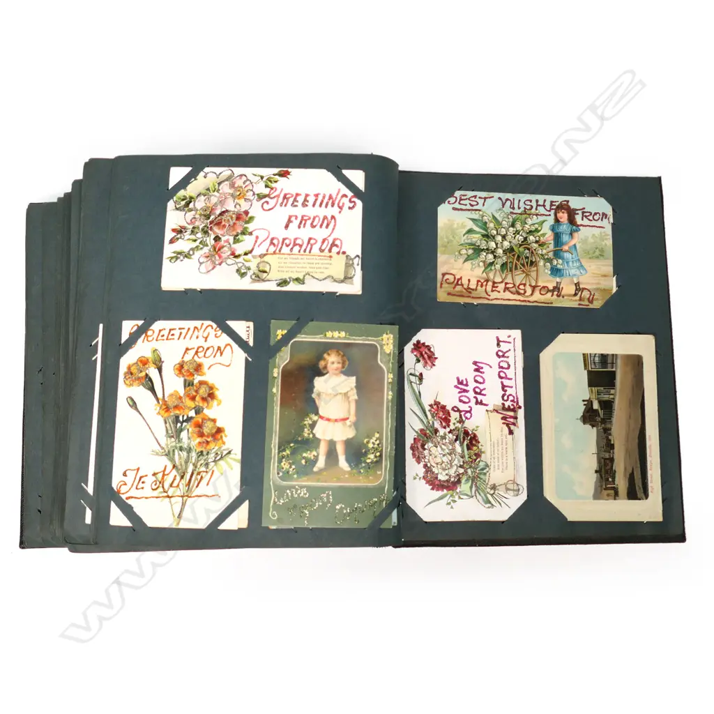 An Edwardian postcard album, containing two hundred and sixty-five postcards, including forty-one Bruce Bairnsfather 'Fragments from France' cards plus other WWI cards, vintage souvenir, travel, humorous, greetings and Japanese cards. Image 1++