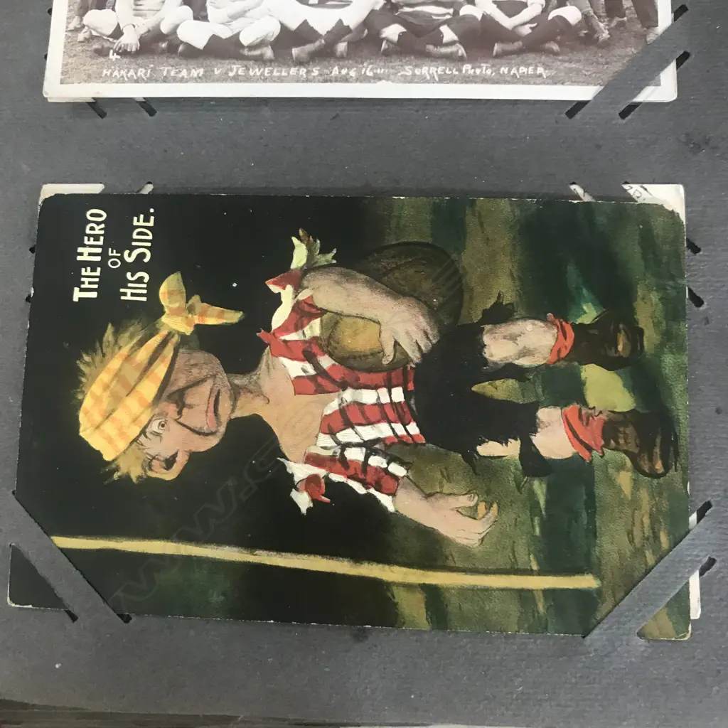 An Edwardian postcard album, contains two hundred and forty-one cards including Louis Wain, Mabel Lucie Attwell, various WWI cards, NZ rugby 1906, Māori rugby tour 1926, greetings cards, etc. Image 1++